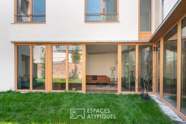Duplex à l’esprit loft avec jardin