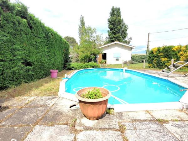 Maison avec piscine et double garage