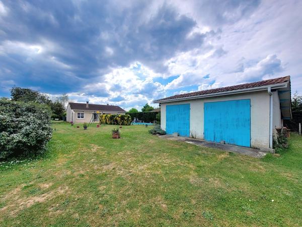 Maison avec piscine et double garage