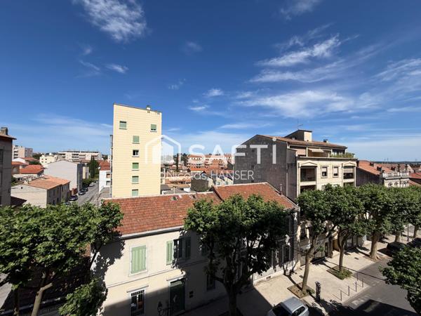 Appartement traversant Est/Ouest plein centre ville d'Alès