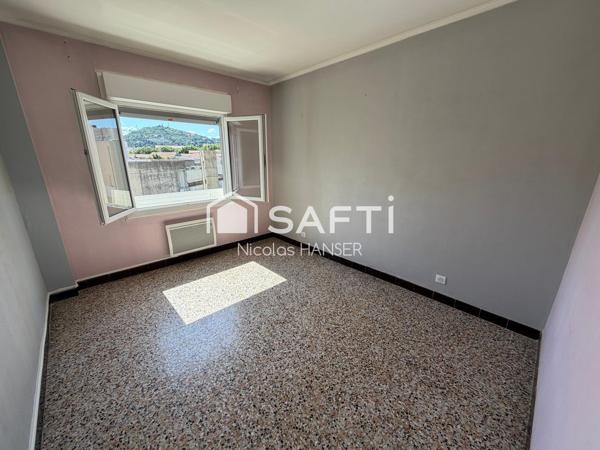 Appartement traversant Est/Ouest plein centre ville d'Alès