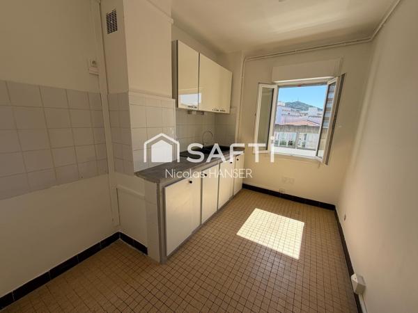Appartement traversant Est/Ouest plein centre ville d'Alès
