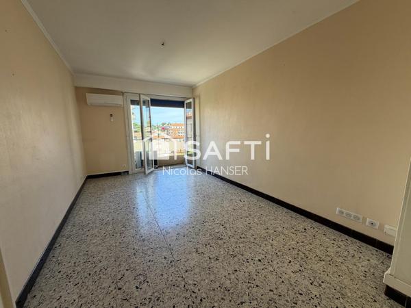 Appartement traversant Est/Ouest plein centre ville d'Alès