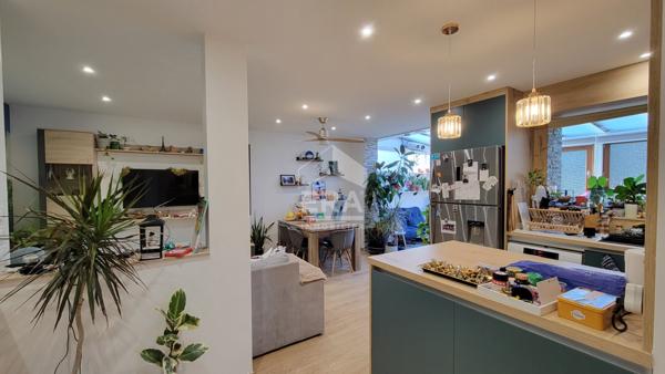 Appartement 2 chambres + garage + places de parking