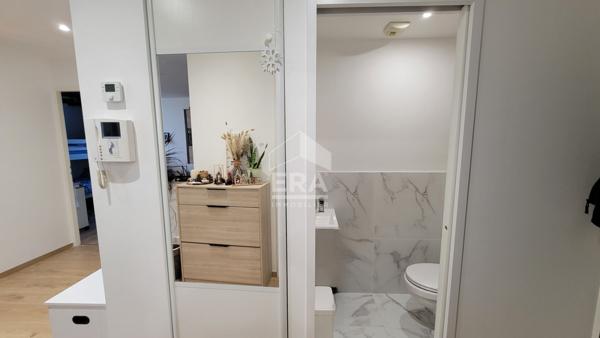 Appartement 2 chambres + garage + places de parking