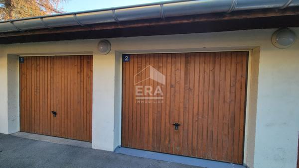 Appartement 2 chambres + garage + places de parking