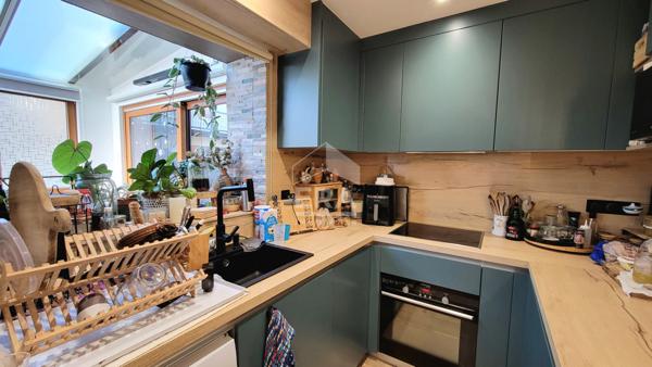 Appartement 2 chambres + garage + places de parking