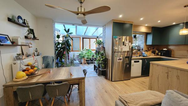 Appartement 2 chambres + garage + places de parking