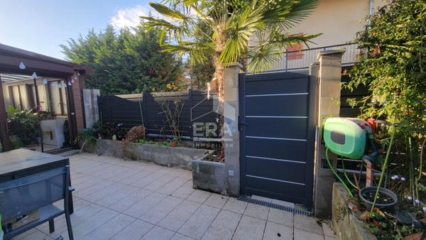 Appartement 2 chambres + garage + places de parking