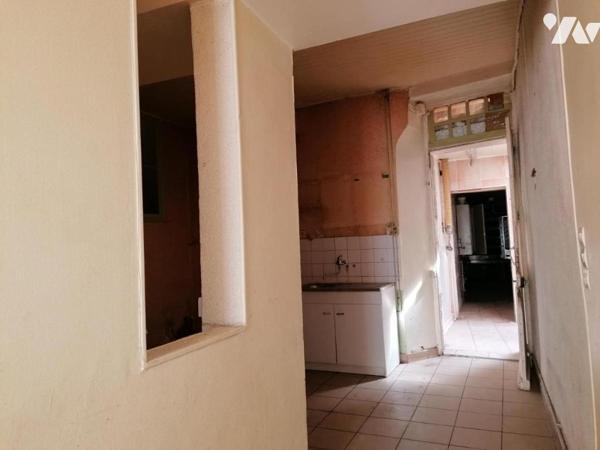 IMMEUBLE local commercial + appartement