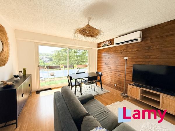 Appartement + stationnement + cave