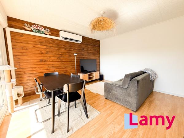 Appartement + stationnement + cave