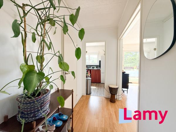 Appartement + stationnement + cave