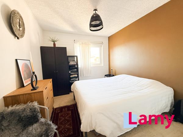 Appartement + stationnement + cave