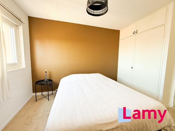 Appartement + stationnement + cave