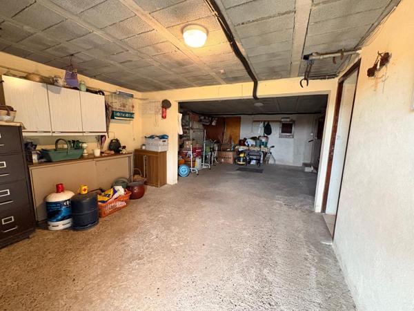 Maison 103 m2 - Véranda 33 m2 - 3 chambres - garage et atelier 60 m2 - terrain 420 m2