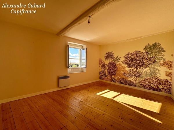 LA REOLE CENTRE VILLE - Maison en pierres avec balcon