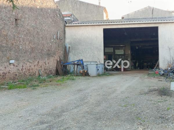 Hangar de caractère sur terrain constructible