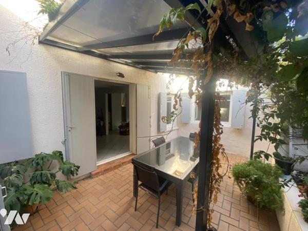 Maisonnette T2 avec combles aménagés et petit jardin