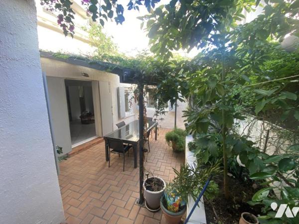 Maisonnette T2 avec combles aménagés et petit jardin