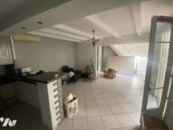 Maisonnette T2 avec combles aménagés et petit jardin