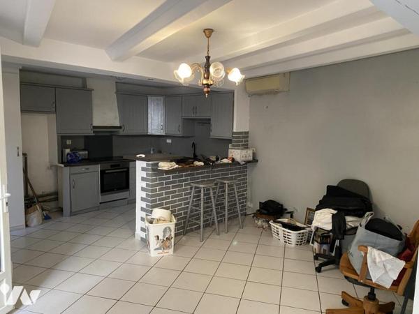 Maisonnette T2 avec combles aménagés et petit jardin