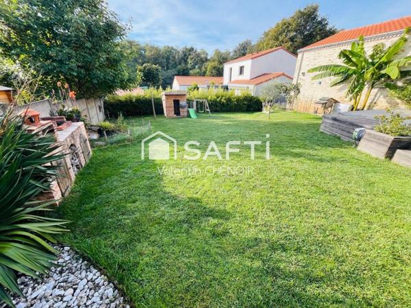 Longère 6 pièces rénovée avec authenticité et modernité en village à 10 minutes de Nantes