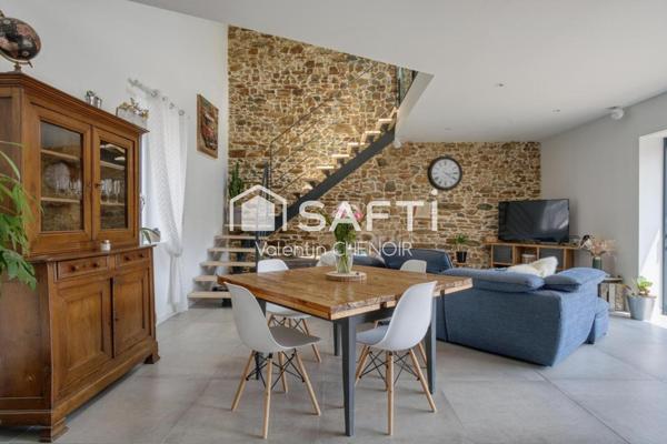 Longère 6 pièces rénovée avec authenticité et modernité en village à 10 minutes de Nantes