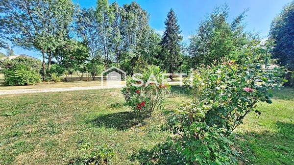 Maison 4 chambres - garage - grand Jardin