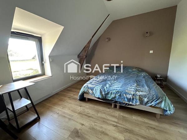 MAISON A VENDRE  EN PIERE REFAIT A NEUF