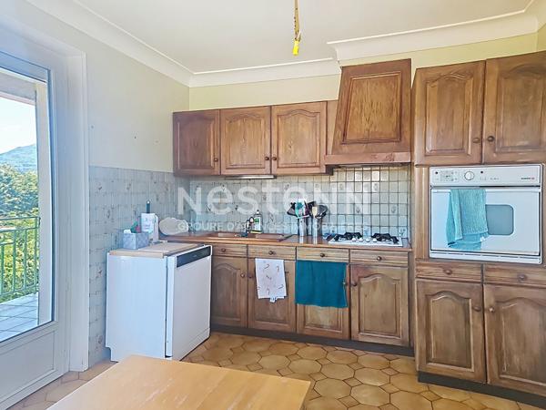 EXCLUSIVITE ! CENTRE RETOURNAC  MAISON TRADITIONNELLE avec 4 chambres sur1300 M2 DE TERRAIN avec double garage
