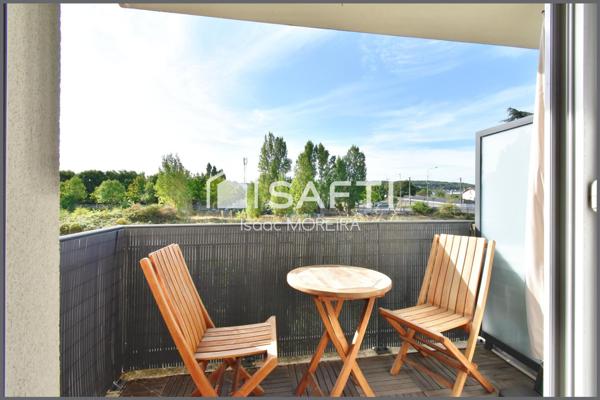 Appartement 2 chambres avec balcon, cave et parkings