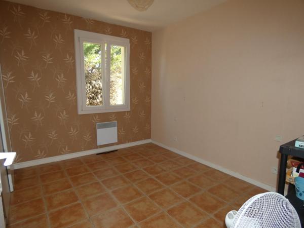 Villa 4 faces plain pied 100m² avec garage sur terrain piscinable de 859m²