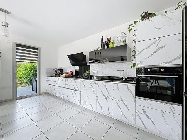 Spacieux appartement 4 pièces de 98 m² à vendre sur Epagny Metz-Tessy, avec terrasse, jardin, cave et parking