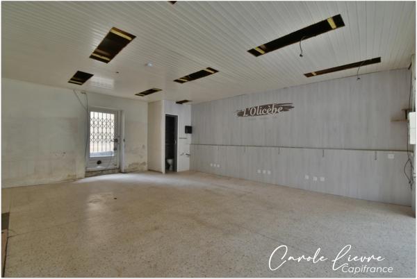 Immeuble avec local commercial et grand appartement sur LEZIGNAN LA CEBE