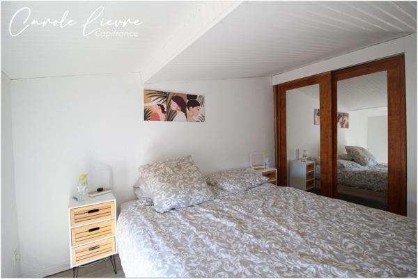 Immeuble avec local commercial et grand appartement sur LEZIGNAN LA CEBE