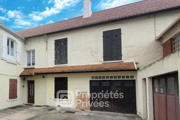 Maison en hypercentre à rénover avec jardin et cave voûtée