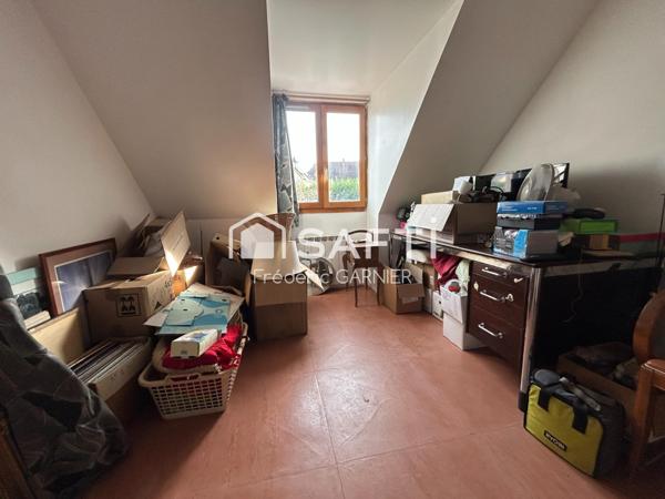 Maison de 104 m², 6 pièces, 4 chambres, terrain de 879 m²