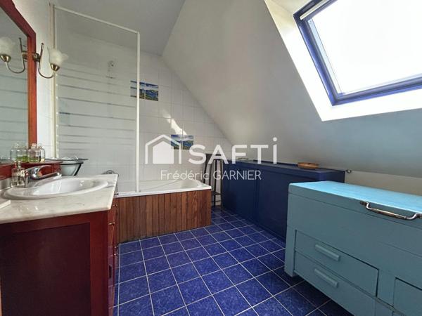 Maison de 104 m², 6 pièces, 4 chambres, terrain de 879 m²