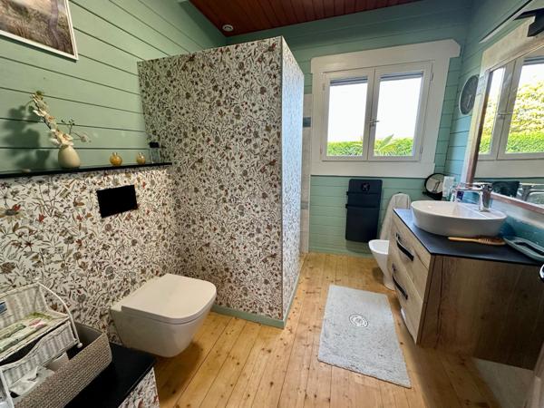 Maison en bois massif de 120m² avec gîte indépendant attenant sur une parcelle de 2800m²