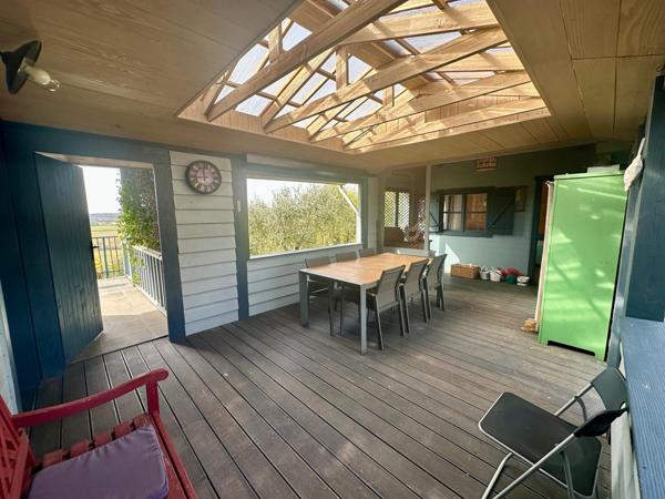 Maison en bois massif de 120m² avec gîte indépendant attenant sur une parcelle de 2800m²