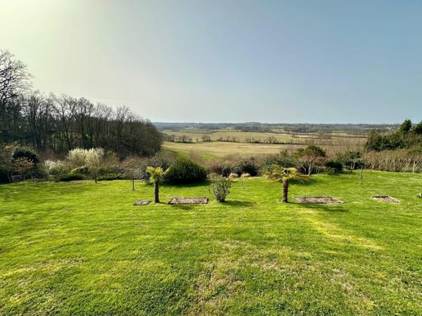 Maison en bois massif de 120m² avec gîte indépendant attenant sur une parcelle de 2800m²