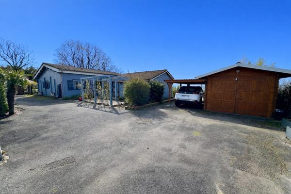 Maison en bois massif de 120m² avec gîte indépendant attenant sur une parcelle de 2800m²