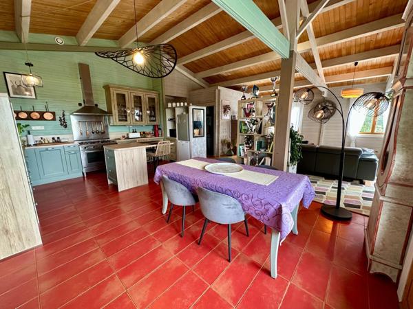 Maison en bois massif de 120m² avec gîte indépendant attenant sur une parcelle de 2800m²