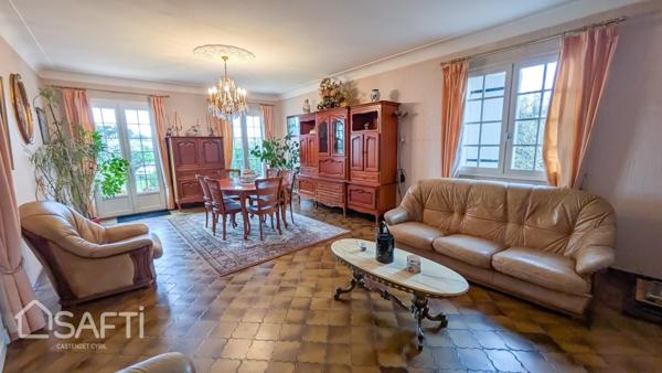 BEAU JARDIN ET PLUS DE 160 M² DE GARAGES ET SOUS SOL AMENAGE