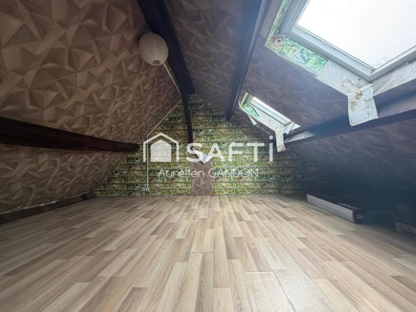 Immeuble avec 2 appartement et 1 local commercial