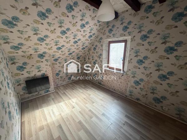 Immeuble avec 2 appartement et 1 local commercial
