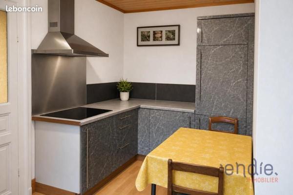 Immeuble de caractére avec local commercial et appartement avec fort potentiel
