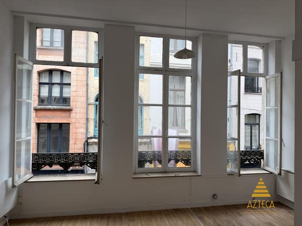 Immeuble de rapport Vieux Lille – Commerce loué + 3 appartements – Emplacement premium