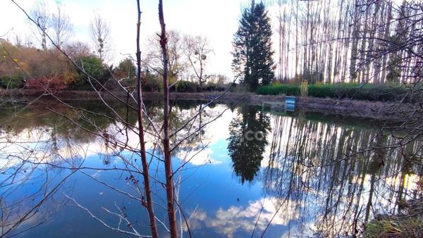 Terrain de 4 445,00 m² avec étang à MEZIERES SUR OISE (02)